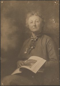 Woman Holding Magazine